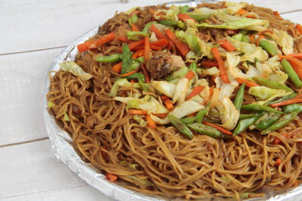 Pancit at Jav's Kaldero Surrey BC - Stir-fried rice noodles with vegetables, meat, and savory sauce